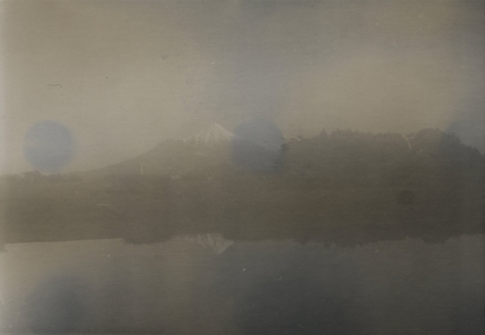 Mt Egmont reflected in Victoria Park in the mist