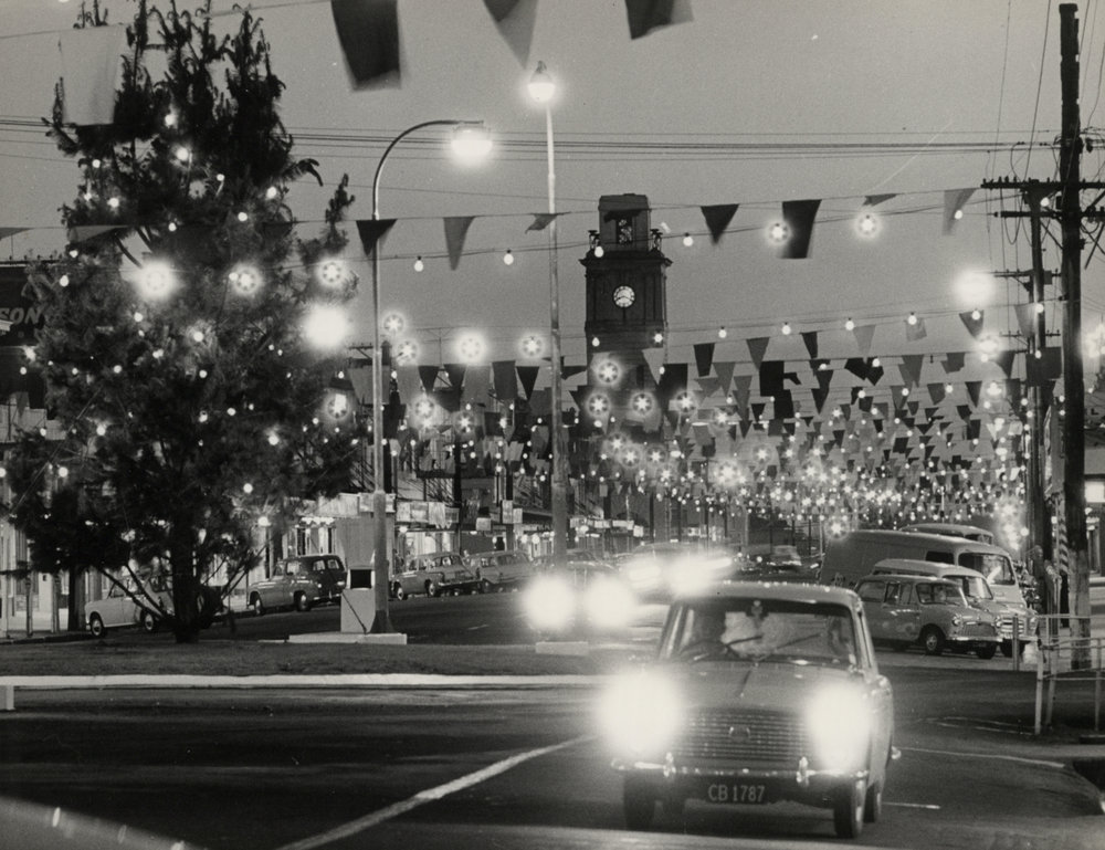 Broadway with Christmas tree and lights at night 