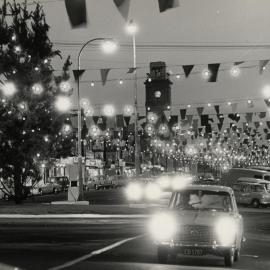 Broadway with Christmas tree and lights at night 