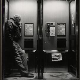 Leo Carrington in Public Phonebox Outside Post Office