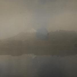 Mt Egmont reflected in Victoria Park in the mist